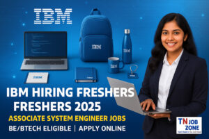 IBM Associate System Engineer Recruitment 2025 Hiring Freshers 2025 recruitment banner for Associate System Engineer jobs. Blue corporate background with IBM-branded laptop, backpack, bottle, mug, and notebook. A smiling Tamil fresher in formal dress holding a laptop is shown on the right. Text overlay: IBM Hiring Freshers 2025 | Associate System Engineer Jobs | BE/BTech Eligible | Apply Online. TN Job Zone logo with tagline Tamil Nadu’s No.1 Job Portal at the bottom.